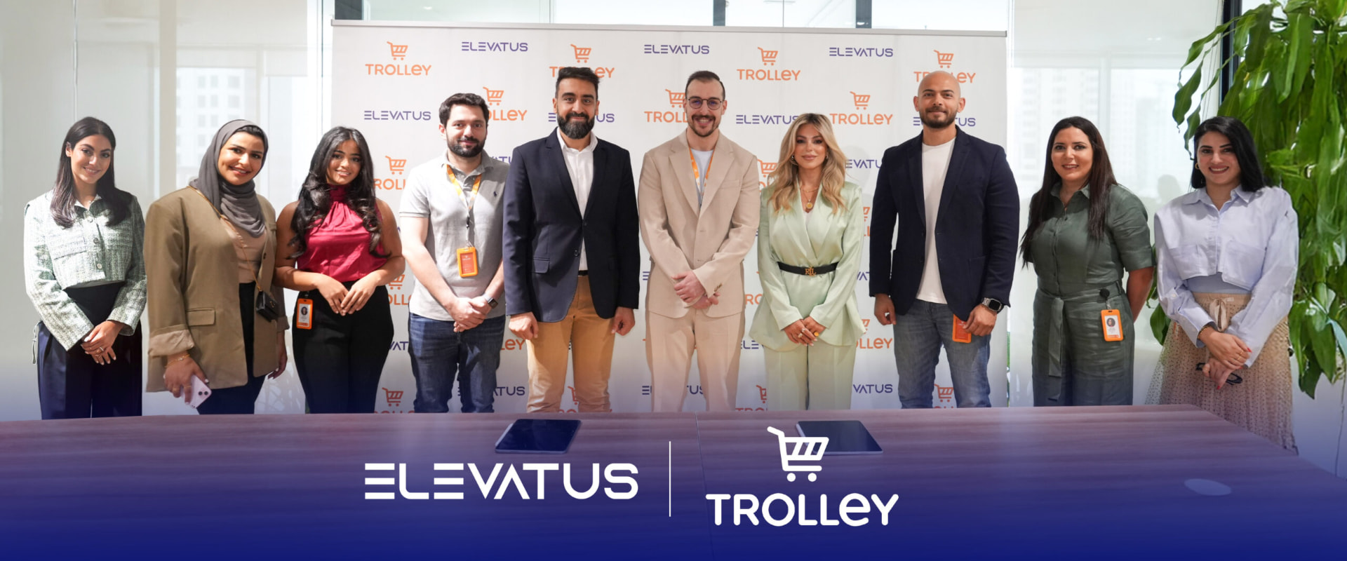 Elevatus and Trolley teams celebrating their partnership